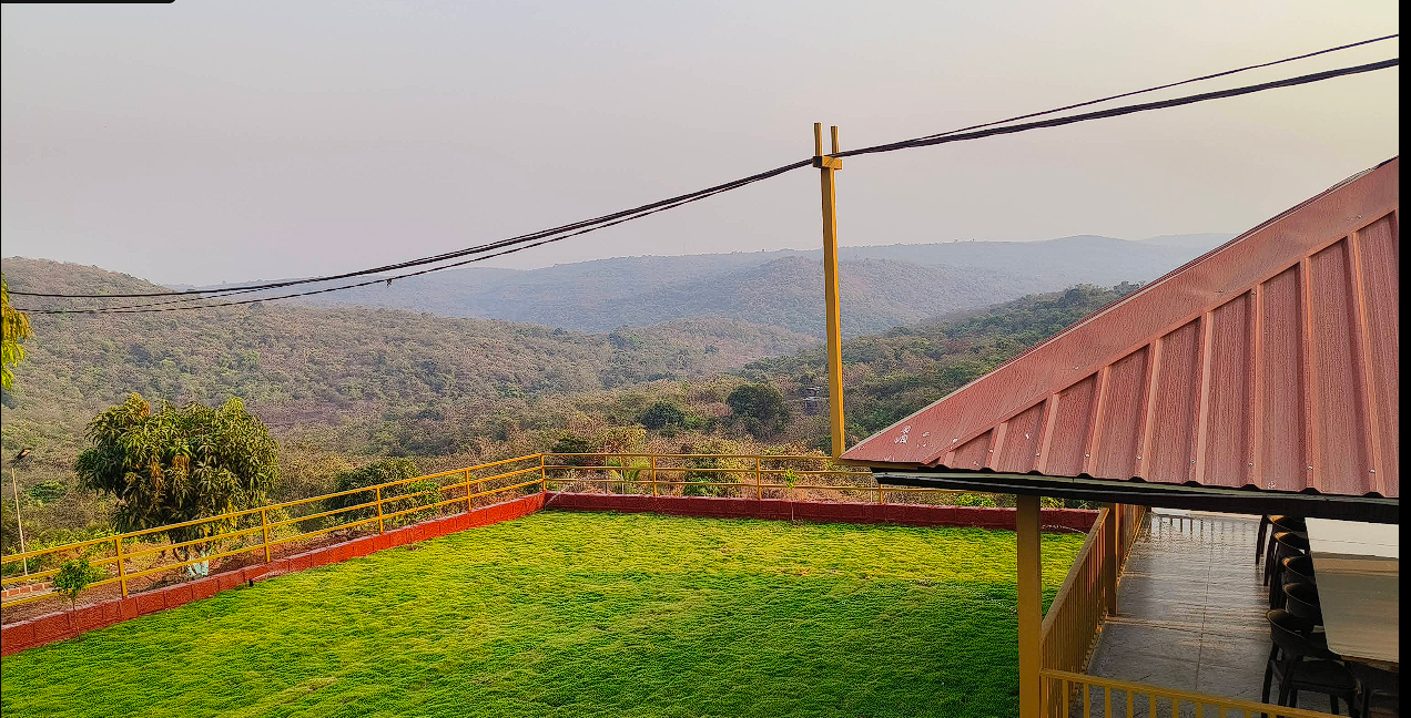 Peaceful landscape view from Raigad cottages